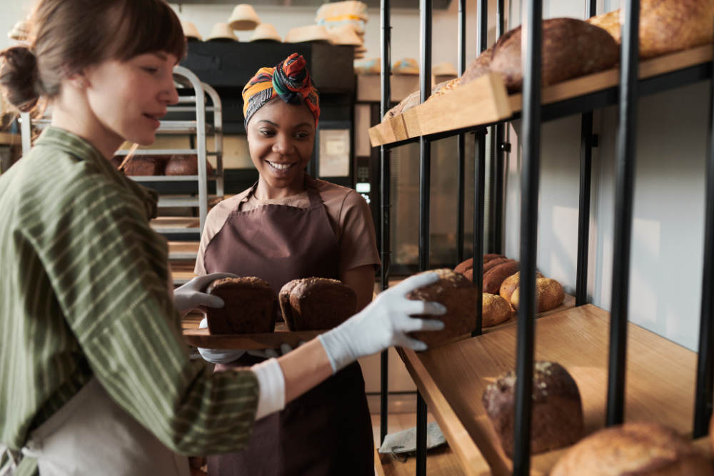 People baking bread in bakery Divi Magic Bakery theme layout for WordPress
